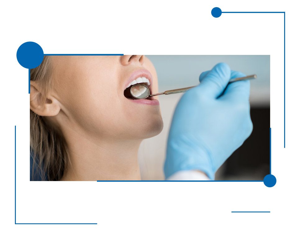 Dental crown lengthening procedure being performed on a woman by dentist